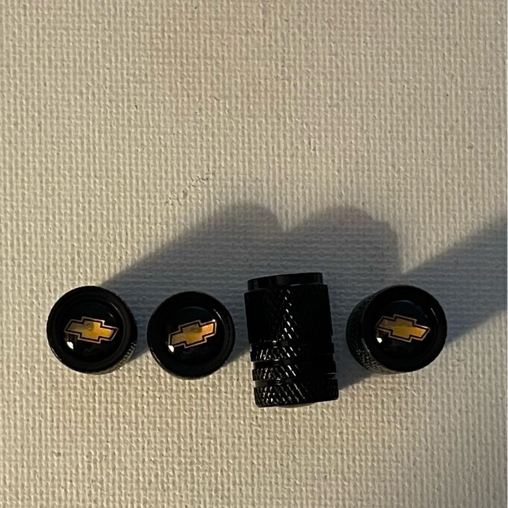 Chevrolet Logo valve Stem caps in black set of 4 NWT